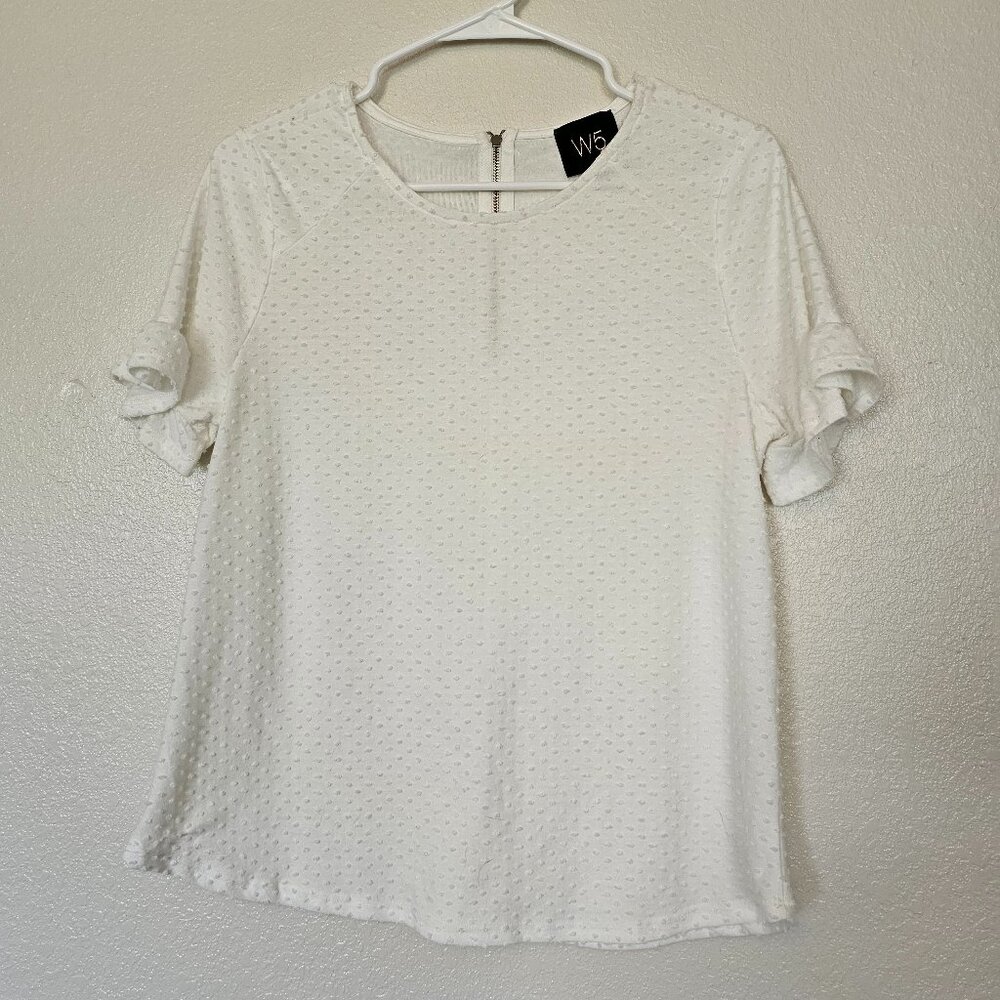 White polka dot shirt